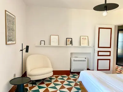 Letto o letti in una camera di Super Giù - Rooftop Skyline