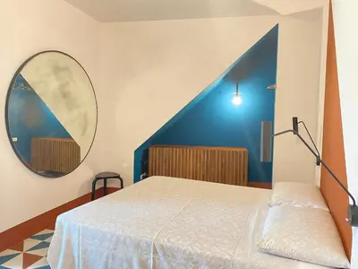 Letto o letti in una camera di Super Giù - Rooftop Skyline