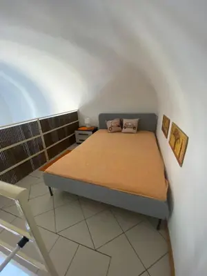 Letto o letti in una camera di Casa Catania Inn