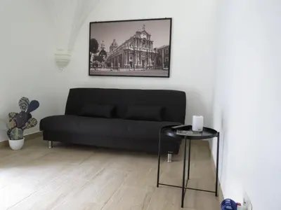 Area soggiorno di Suite 241 Catania