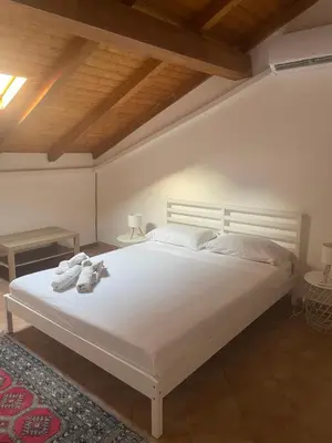 Letto o letti in una camera di Narciso Katane suites