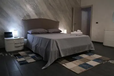 Letto o letti in una camera di Sweet House Melania