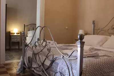 Letto o letti in una camera di Notobarocco