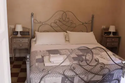 Letto o letti in una camera di Notobarocco
