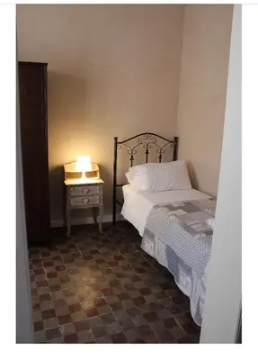 Letto o letti in una camera di Notobarocco