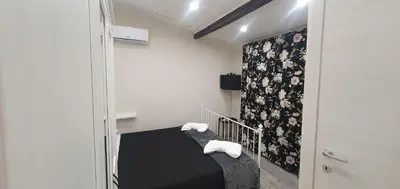Letto o letti in una camera di Cortile Gallinaccio