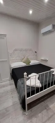 Letto o letti in una camera di Cortile Gallinaccio
