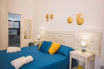 Letto o letti in una camera di Mito & Mare