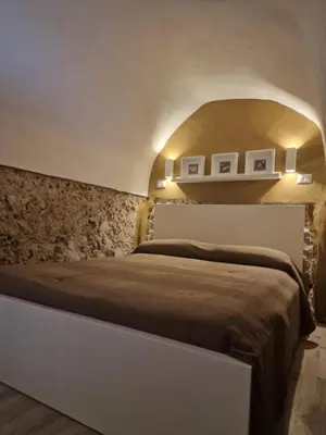 Letto o letti in una camera di CASA AGATA E SANTO SHORT LETS