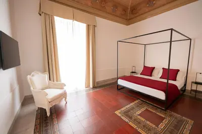 Letto o letti in una camera di B. Sicilian Charming Stay Historical Suite