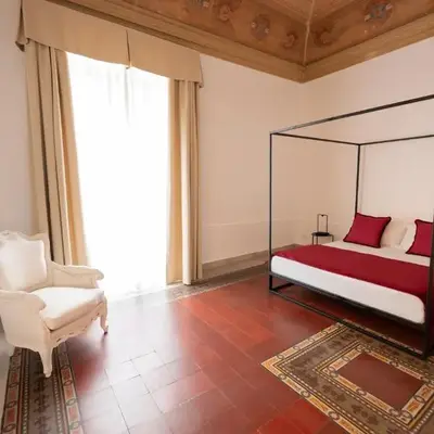 B. Sicilian Charming Stay Historical Suite