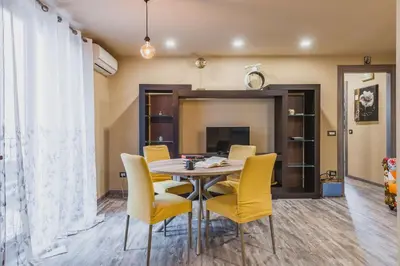 TV o dispositivi per l'intrattenimento presso Ursino apartment with balcony by Wonderful Italy
