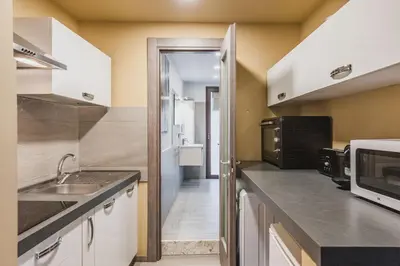 Cucina o angolo cottura di Ursino apartment with balcony by Wonderful Italy