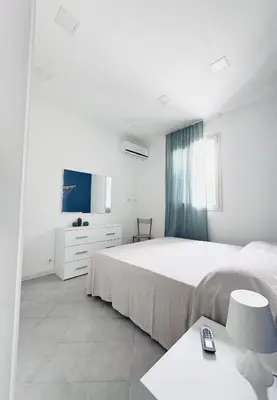 Letto o letti in una camera di Casa alma
