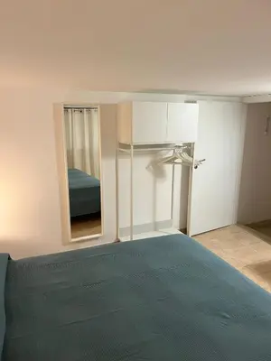 Letto o letti in una camera di Casa Cavour
