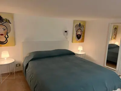 Letto o letti in una camera di Casa Cavour