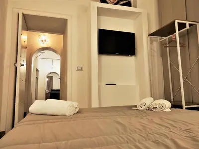 Letto o letti in una camera di Athena Apartment- Ortigia Holidays