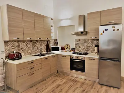 Cucina o angolo cottura di Athena Apartment- Ortigia Holidays
