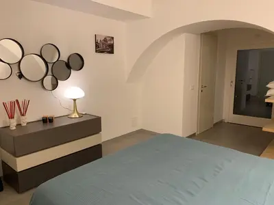 Letto o letti in una camera di La Suite di Piazza dell'Università