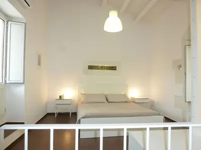 Letto o letti in una camera di Dimora d'Artista