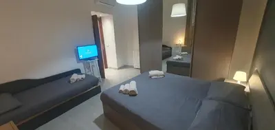TV o dispositivi per l'intrattenimento presso Domus Odeon la casa nel parco archeologico di Catania