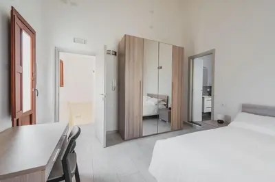 Letto o letti in una camera di Modern duplex with balcony by Wonderful Italy