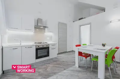 Cucina o angolo cottura di Modern duplex with balcony by Wonderful Italy