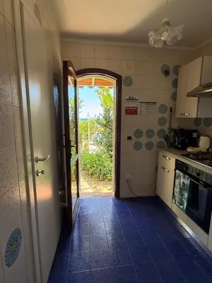 Cucina o angolo cottura di Riviera Villa sul mare