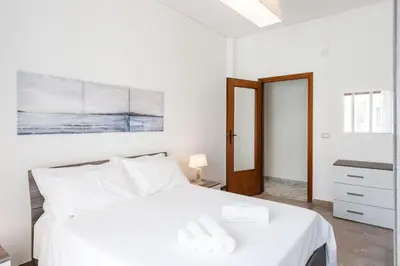 Letto o letti in una camera di Casa Adda by Wonderful Italy