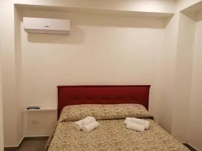 Letto o letti in una camera di Home Cipriana