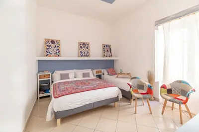 Letto o letti in una camera di Elsa d'Ortigia