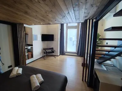 TV o dispositivi per l'intrattenimento presso Gray Suite con sauna