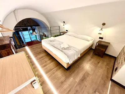 Letto o letti in una camera di Gray Suite con sauna
