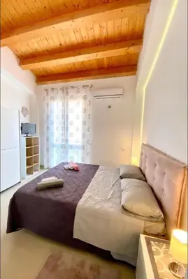 Letto o letti in una camera di Casa Martina