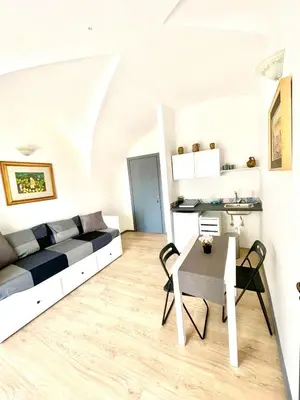 Area soggiorno di Gesuiti Rooms Catania