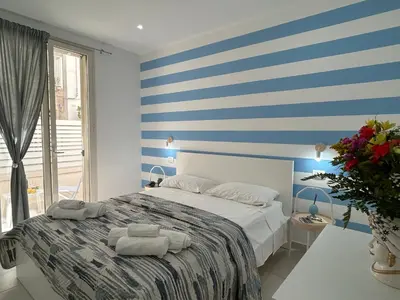 Letto o letti in una camera di Sunlands 50 meters from the sandy beach with wifi