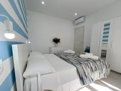 Letto o letti in una camera di Sunlands 50 meters from the sandy beach with wifi