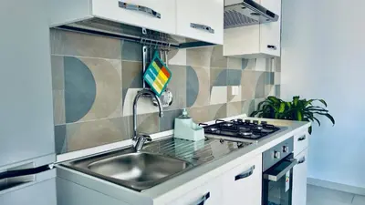 Cucina o angolo cottura di Sealands 50 meters from the sandy beach with wifi
