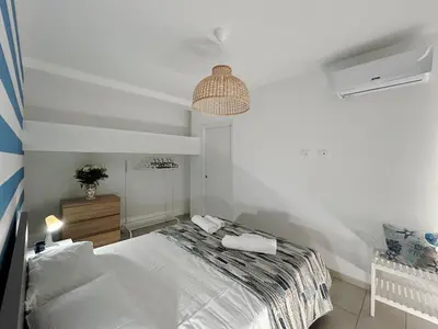 Letto o letti in una camera di Sealands 50 meters from the sandy beach with wifi