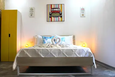 Letto o letti in una camera di Terrace- Walk to Porta Reale and Cafes - La Casa della Pietra - Near Wine Tasting