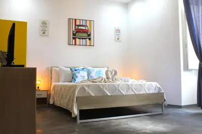 Letto o letti in una camera di Terrace- Walk to Porta Reale and Cafes - La Casa della Pietra - Near Wine Tasting