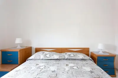 Letto o letti in una camera di casa Simona