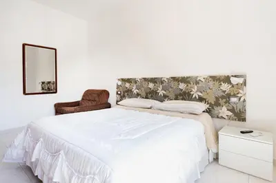 Letto o letti in una camera di casa Simona