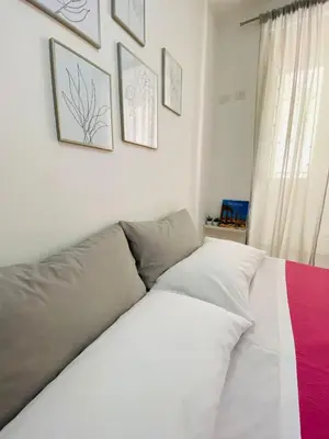 Letto o letti in una camera di Casa 68 Ortigia