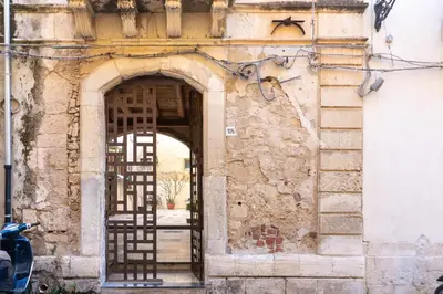 Facciata o entrata di GuestHost - Gli Archi di Ortigia - Cala Rossa Cozy Apartment