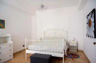 Letto o letti in una camera di Da DOMITILLA in centro storico con panorama