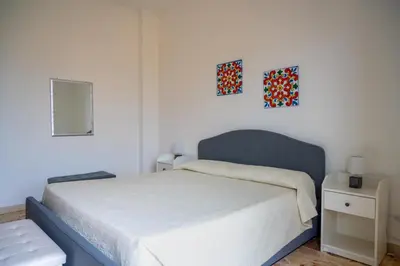 Letto o letti in una camera di Da DOMITILLA in centro storico con panorama