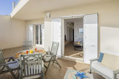 Balcone o terrazza di ISULATRAVEL - House on the beach Piano Terra
