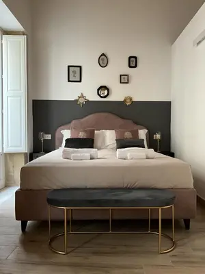 Letto o letti in una camera di Rua 39 fine apartments by Dimore in Sicily