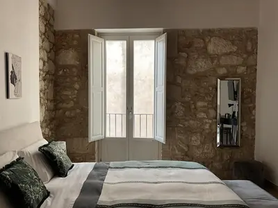 Letto o letti in una camera di Rua 39 fine apartments by Dimore in Sicily